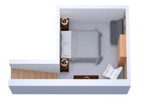 an overhead view of a small room with a bed at La Ferme du Nant - Portes du Soleil in La Chapelle-dʼAbondance
