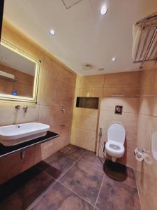 Koupelna v ubytování White Water Resorts + 23 fotografií