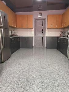 Kuchyň nebo kuchyňský kout v ubytování Hotel Mia