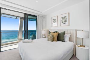 Jewel Beachfront Residences客房内的一张或多张床位