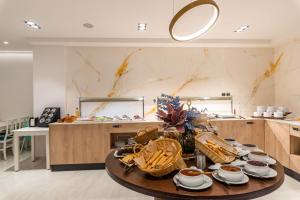 a kitchen with a table with food on it at Summer Dream in Rethymno Town