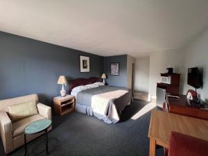 Postel nebo postele na pokoji v ubytování BIGGS NU-VU MOTEL