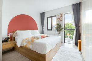A bed or beds in a room at Crescendo Boutique Studio - STAY 24h