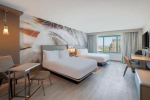 Postel nebo postele na pokoji v ubytování Tucson Marriott University Park + 37 fotografií