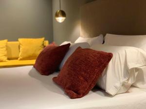 Postel nebo postele na pokoji v ubytování Re Sale Boutique Hotel