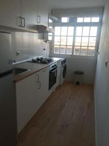 Η κουζίνα ή μικρή κουζίνα στο Apartamento/Flat San Fernando Cádiz +11 φωτογραφίες