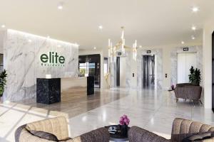 a lobby with two chairs in a building at Urban Lifestyle 1BR in Westlands, Heated Pool, Gym, Workspace & Parking in Nairobi +89 photos