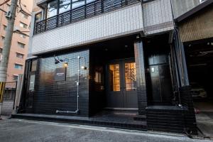 a building with a door on the side of it at COTE sakuragawa "Room 201,301,401" - Vacation STAY 03134v in Osaka