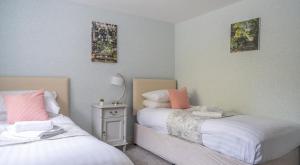 Кровать или кровати в номере Grassholme Cottage