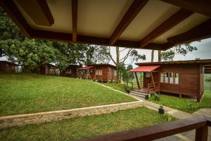 a view from the porch of a house at Stanmore Garden Bungalow in Vālpārai