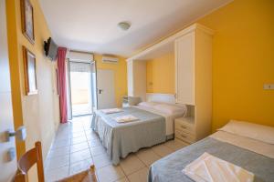 Letto o letti in una camera di Di Matteo Hotel