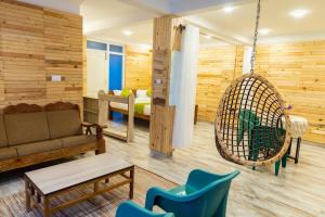 Posezení v ubytování FabExpress RMK Nest - Nr Chettiar Park