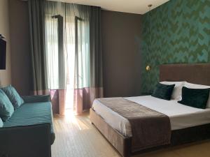 Postel nebo postele na pokoji v ubytování Re Sale Boutique Hotel