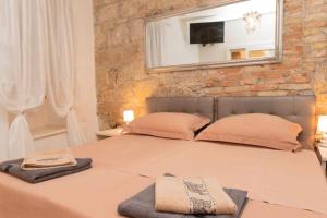 Säng eller sängar i ett rum på ApartmentTHE old centar of Split