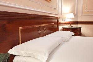 Postel nebo postele na pokoji v ubytování Hotel Hiberia