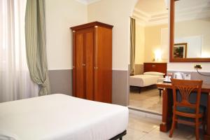 Postel nebo postele na pokoji v ubytování Hotel Hiberia
