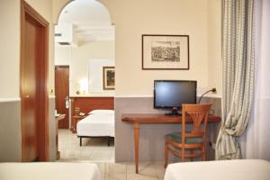 Postel nebo postele na pokoji v ubytování Hotel Hiberia