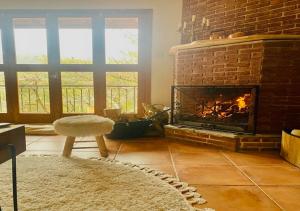 Posezení v ubytování Vavatsinia Panorama Cottage
