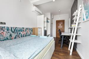 Postel nebo postele na pokoji v ubytování Quattro Loft Hostel