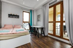 Postel nebo postele na pokoji v ubytování Quattro Loft Hostel