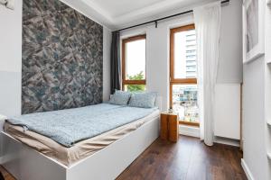 Postel nebo postele na pokoji v ubytování Quattro Loft Hostel