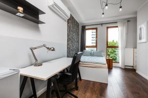 Posezení v ubytování Quattro Loft Hostel
