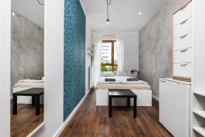 Postel nebo postele na pokoji v ubytování Quattro Loft Hostel