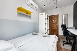 Postel nebo postele na pokoji v ubytování Quattro Loft Hostel