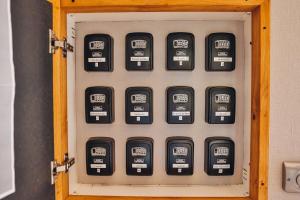 a set of dials on a machine in a room at Domaine Grand Piquecaillou - Appartement Pessac Leognan 