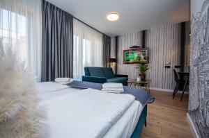 Posteľ alebo postele v izbe v ubytovaní InPoint Drive Inn - Stay&Park Free