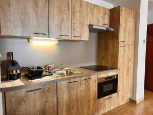 Kuchyňa alebo kuchynka v ubytovaní Appartement station Sainte Foy Tarentaise