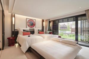 Aleenta Retreat Chiang Mai - The Leading Hotels of the World客房内的一张或多张床位