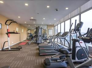 a gym with treadmills and ellipticals in a building at D'CASA Bintang Fairlane at Bukit Bintang in Kuala Lumpur