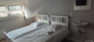 Cama o camas de una habitación en Hotel Bristol