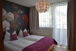 Una cama o camas en una habitación de Hotel Kleißl