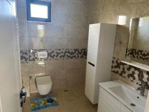 Ett badrum på Parlayan Villa Suite