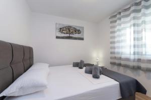 Postel nebo postele na pokoji v ubytování Villa Zrilic ZadarVillas + 28 fotografií