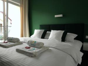 Posteľ alebo postele v izbe v ubytovaní Apartamenty Mistral