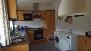 Kuchyň nebo kuchyňský kout v ubytování Ferienwohnung Mueller_ 15121