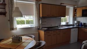 Kuchyň nebo kuchyňský kout v ubytování Ferienwohnung Mueller_ 15121