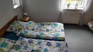 Postel nebo postele na pokoji v ubytování Ferienwohnung Mueller_ 15121