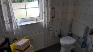 Koupelna v ubytování Ferienwohnung Mueller_ 15121 + 22 fotografií