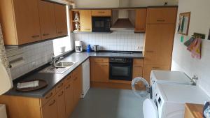 Kuchyň nebo kuchyňský kout v ubytování Ferienwohnung Mueller_ 15121