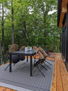 Fotografie z fotogalerie ubytování trähus tremblant v destinaci La Conception