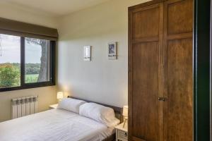Postel nebo postele na pokoji v ubytování Josi