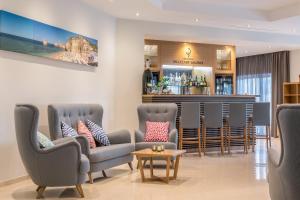 Гостиная зона в Caneiros Luxury House & Suites