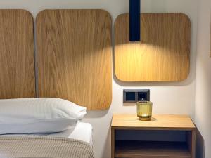 A bed or beds in a room at Petrichor