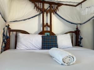 Krevet ili kreveti u jedinici u okviru objekta The Beach House by Maasai