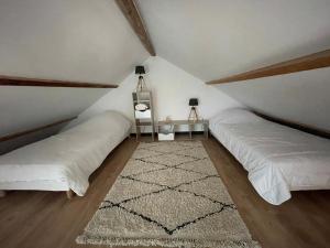 Postel nebo postele na pokoji v ubytování Gîte des Gâtines 3 étoiles