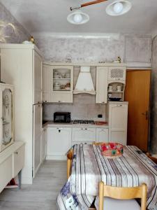 Kuchyň nebo kuchyňský kout v ubytování La Maison du Monde